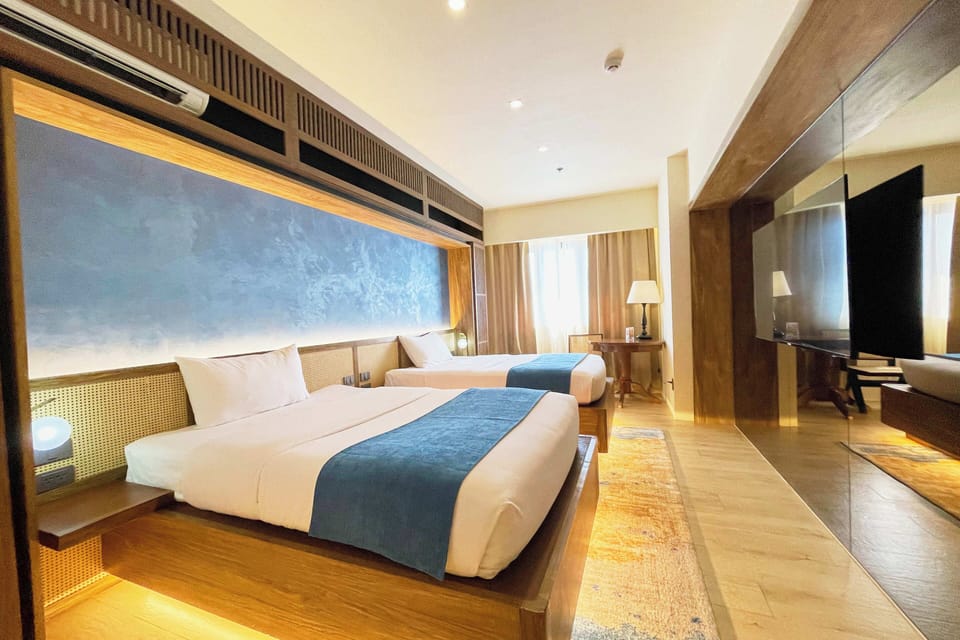 Deluxe Twin Room | Desk, blackout drapes, iron/ironing board (on request), WiFi (free)