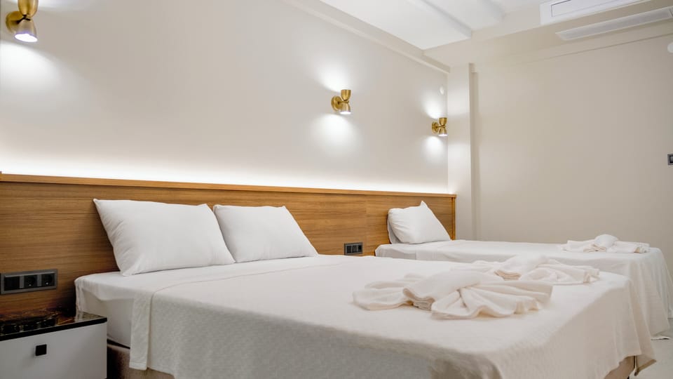 Standard Triple Room, Balcony | Free WiFi