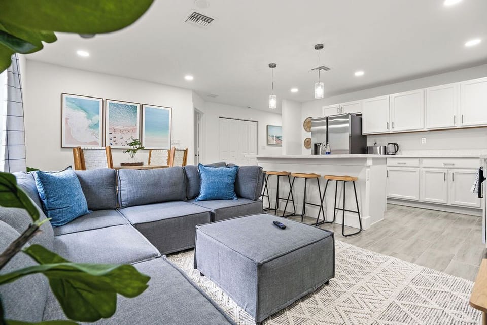 Step into our inviting living room, seamlessly connected to the kitchen, creating the perfect flow for entertaining and everyday living.