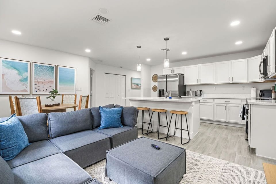 With a cozy couch and a stylish coffee table, it's the ideal space for relaxation and gathering with loved ones. Experience modern design at its best in this beautifully appointed area!