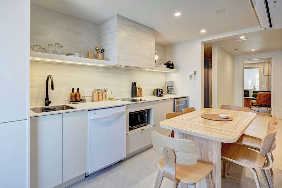 Fully equipped kitchen with seating for 6 people. Perfect for dining in or eating on the go. 