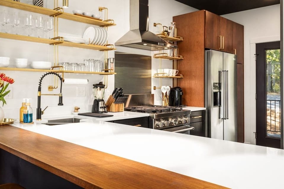 Kitchen with gas stove and professional appliances 