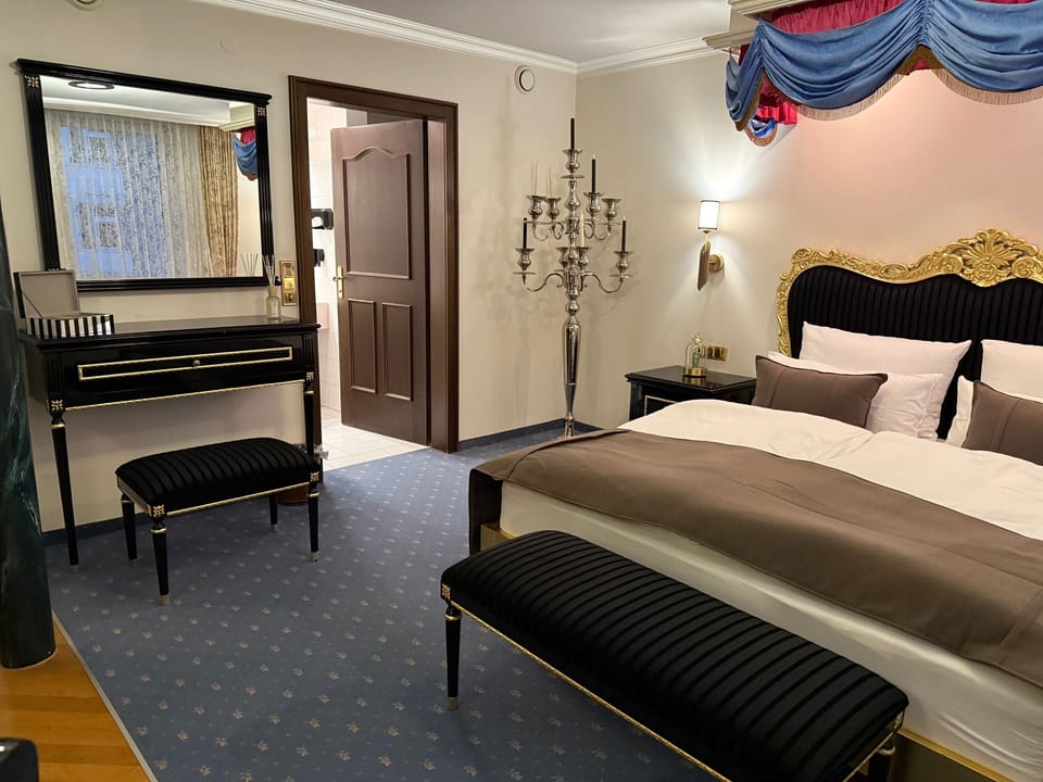 Deluxe Suite, Private Bathroom, City View | In-room safe, desk, blackout drapes, soundproofing