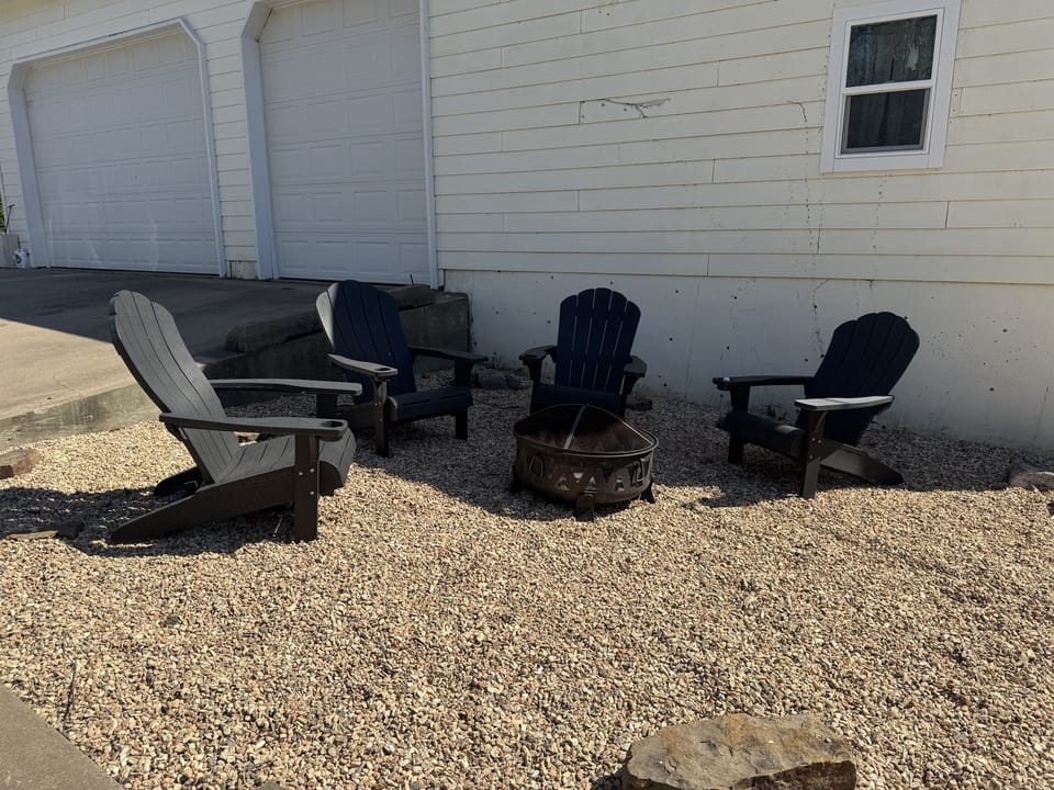 Wood burning firepit & Adirondak chairs 