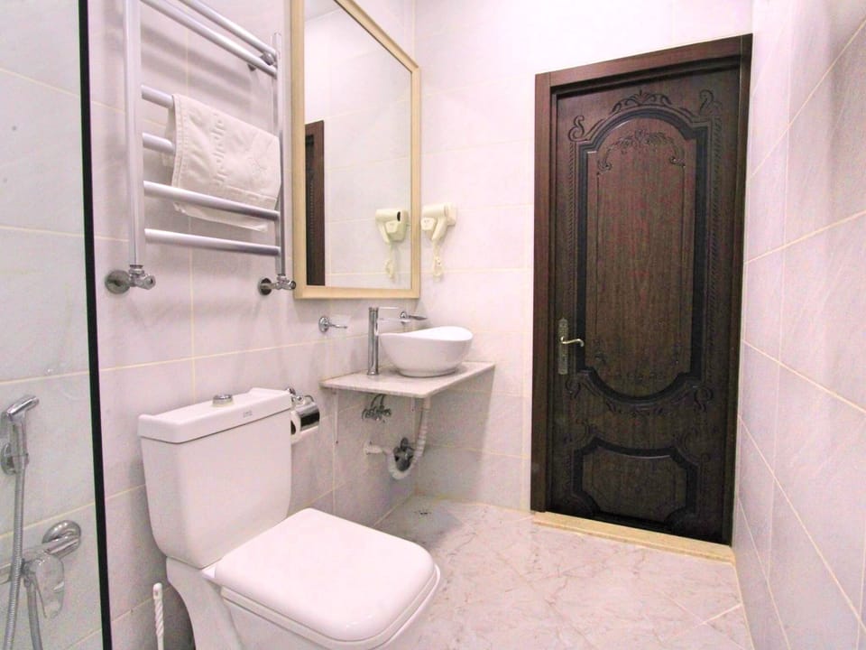 Hair dryer, slippers, towels, soap