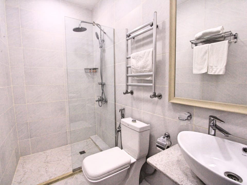 Hair dryer, slippers, towels, soap
