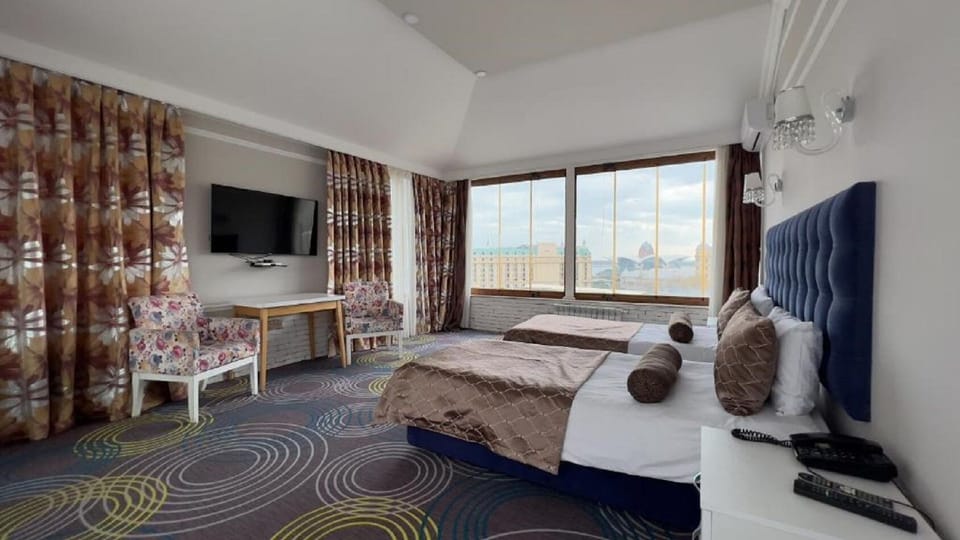 Deluxe Twin Room, Balcony, City View | Premium bedding, Select Comfort beds, minibar, individually decorated