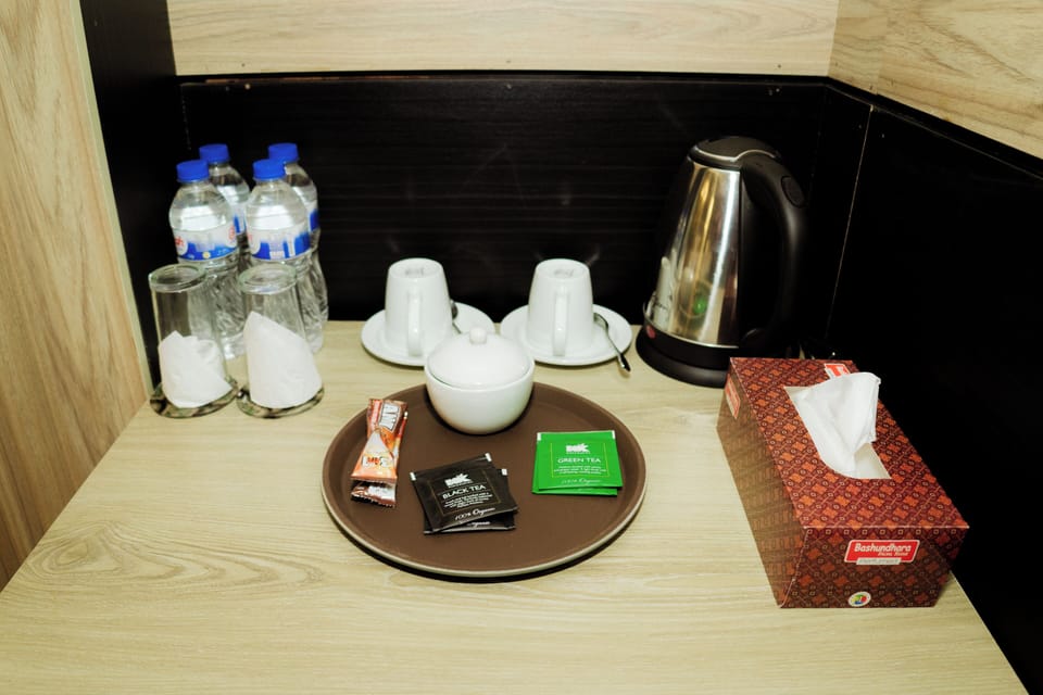 Minibar, desk, laptop workspace, iron/ironing board