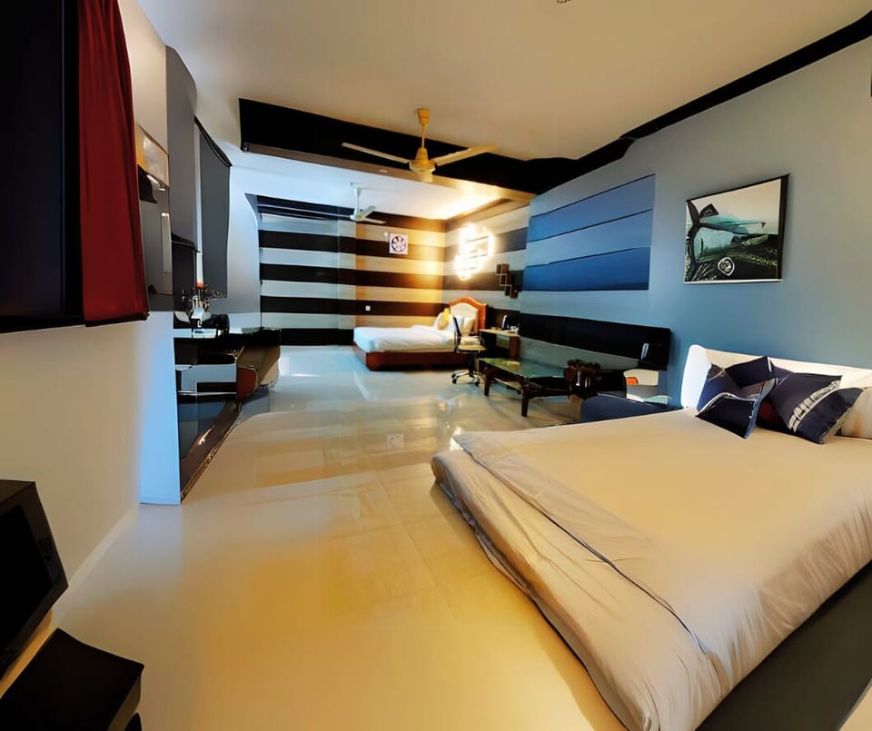 Minibar, desk, laptop workspace, iron/ironing board