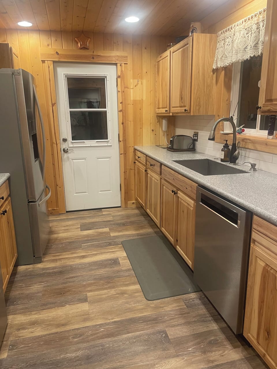 Full kitchen upstairs.