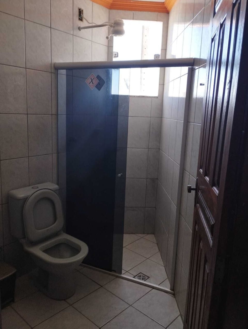 Shower, towels, toilet paper