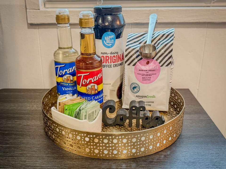 Coffee Bar - 12 cup and Kcup Coffee Maker | Ground Coffee, a few Kcups, Teabags, Syrup, Powdered Creamer, and Sweeteners Provided