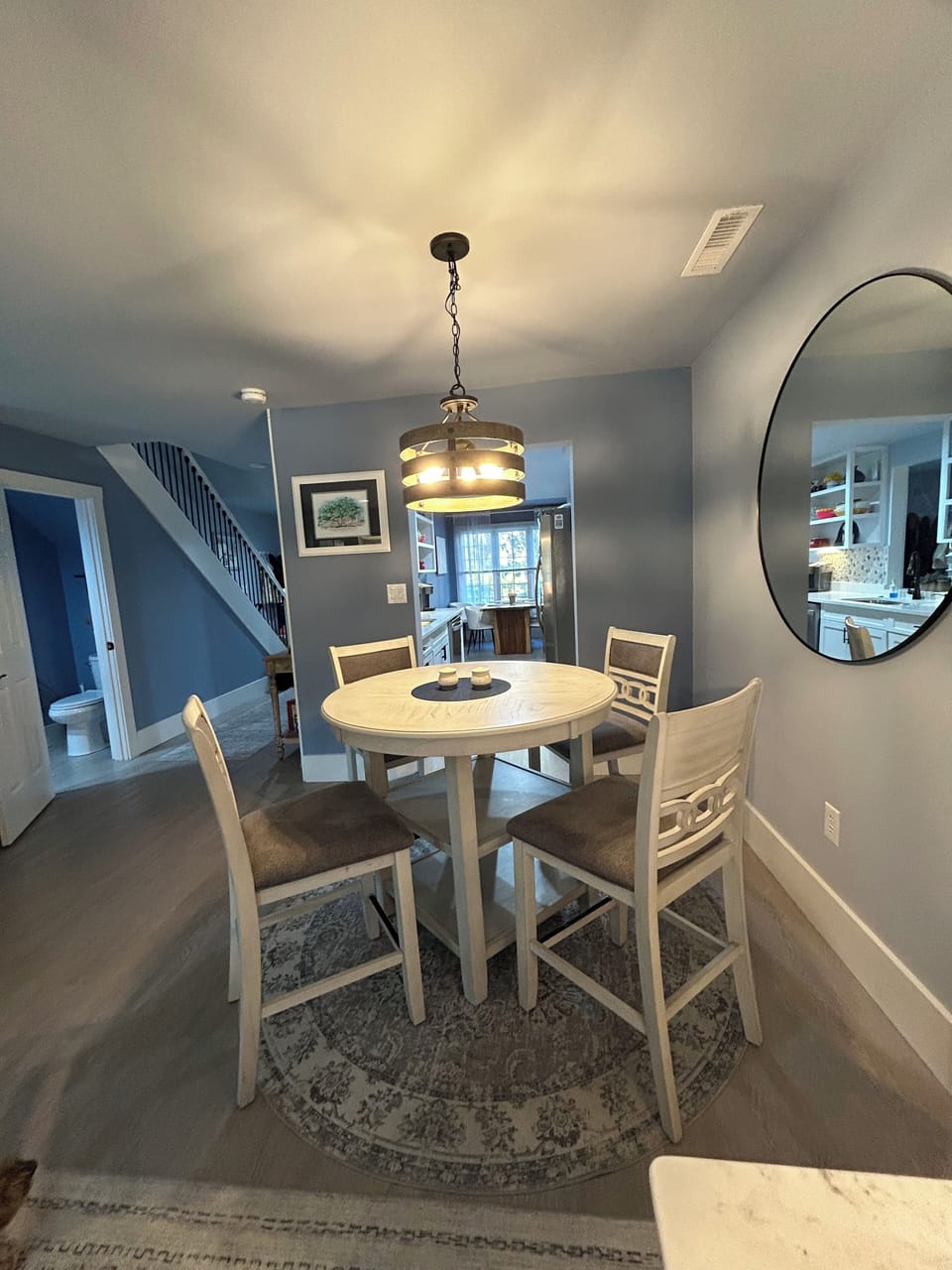 View from living room into kitchen (high top seating for 4)