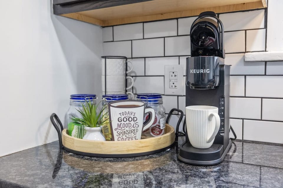 A chef’s dream! Fully equipped with an oven/stove, fridge, dishwasher, microwave, Keurig, kettle, spices, and a convenient pot rack. Plus, a charcoal grill outside for delicious BBQ nights!