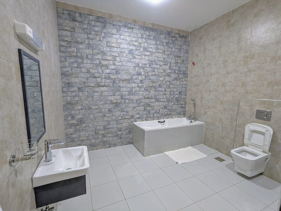 Luxury Double Room, Balcony, Hill View | Bathroom | Separate tub and shower, slippers, bidet, soap