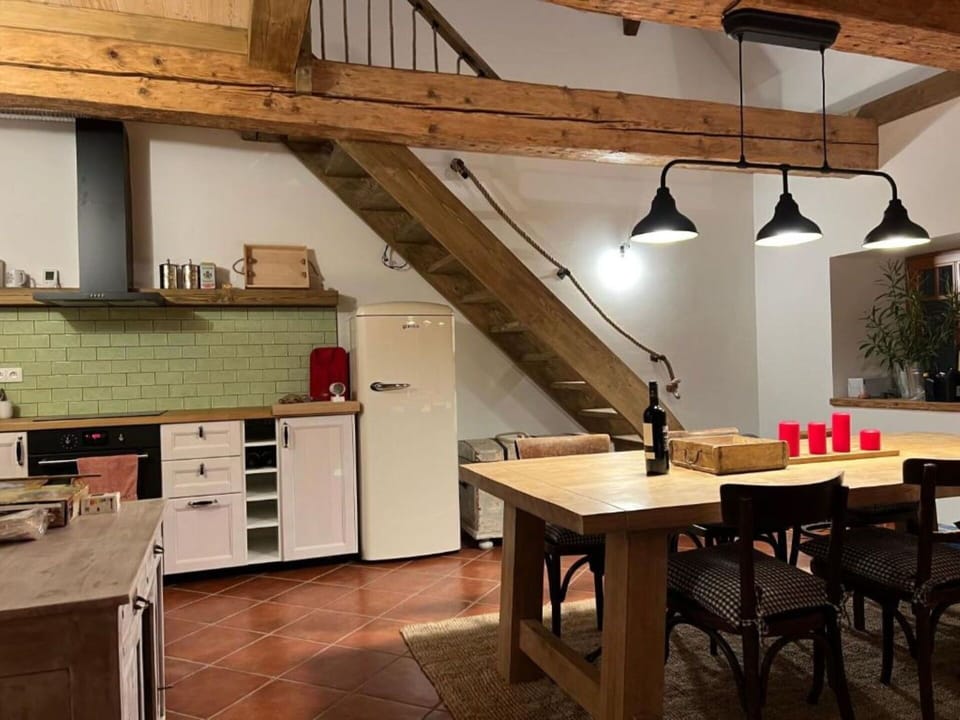 Furniture, Interior Design, Flooring, Kitchen, Floor, Wood, Ceiling, Light Fixture, Countertop, Wood Flooring