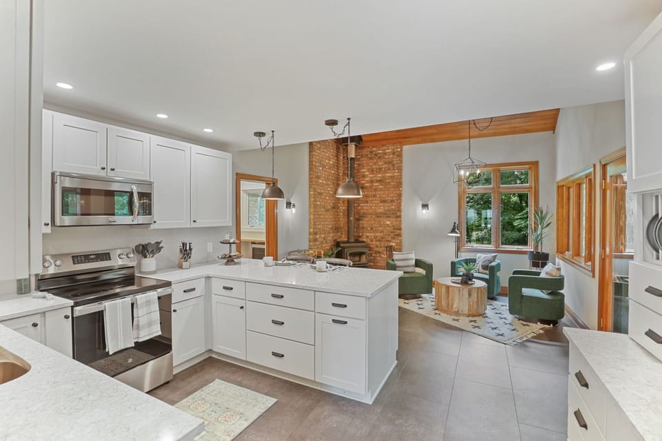 Open kitchen concept to our breakfast nook area allows social time for meals!