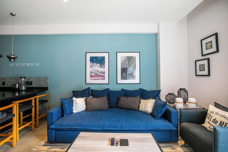 Comfortable living room with smart TV and access to the balcony