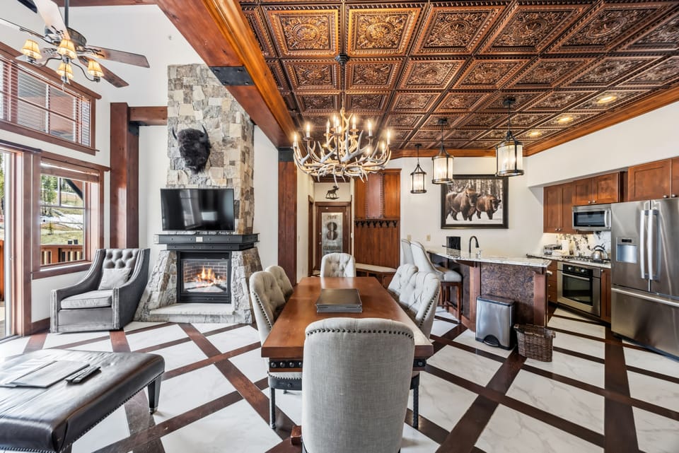Living, dining, and kitchen flow in one continuous space.