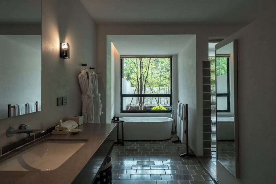 Superior Double Room, Balcony, Mountain View | Bathroom | Separate tub and shower, deep soaking tub, rainfall showerhead