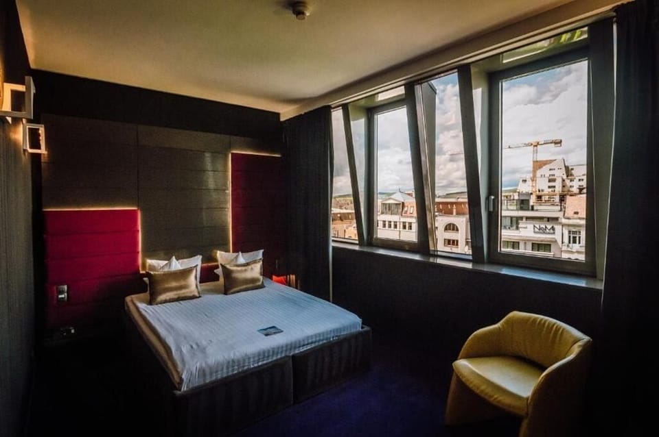 Deluxe Double Room Single Use | In-room safe, desk, laptop workspace, blackout drapes