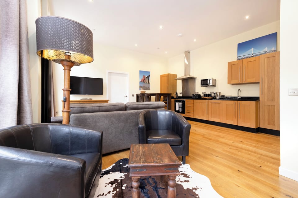Comfort Apartment, City View | Living area | LCD TV