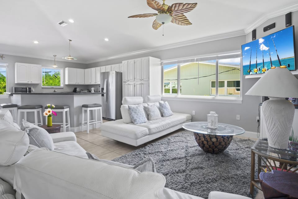 Relax with your loved ones in the living room with a bright, open kitchen just steps away.