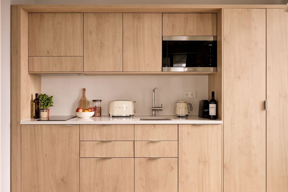Espresso maker, coffee/tea maker, mini-fridge, microwave
