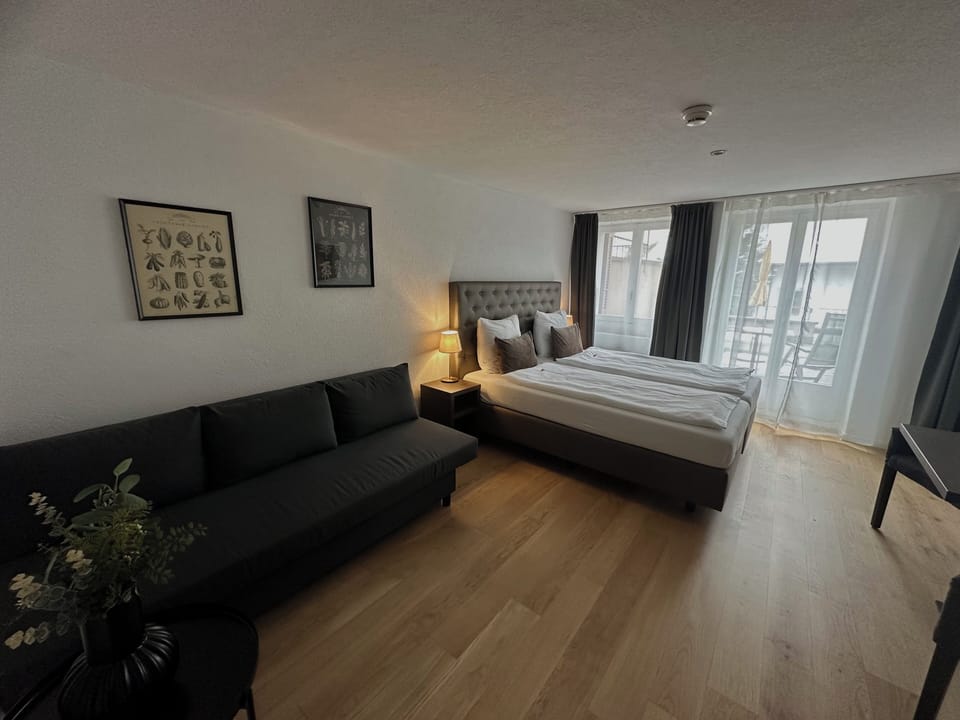Deluxe Double Room | Minibar, desk, iron/ironing board, free cribs/infant beds