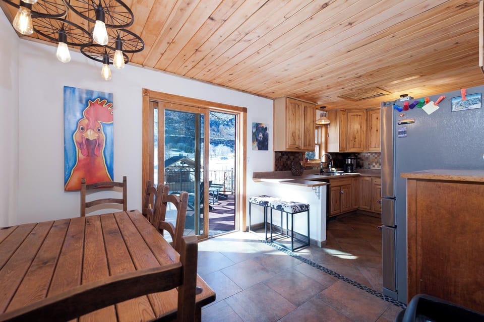 Kitchen and Dining (Access to the deck with the hot tub and backyard)