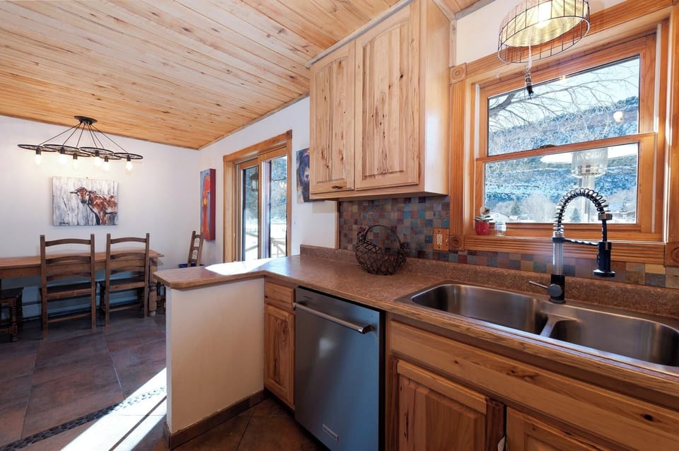 Kitchen and Dining (Access to the deck with the hot tub and backyard)
