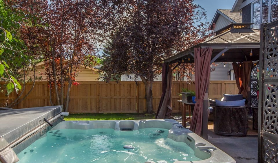 Soak & unwind in your private outdoor hot tub under the stars!