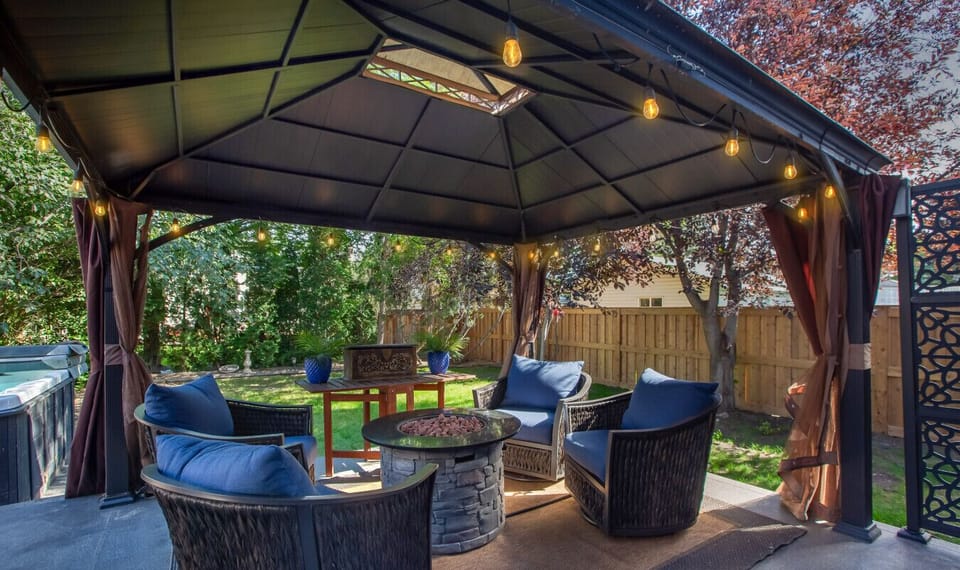 Evenings by the fire—gather, relax, and stay warm around the outdoor fire table.
