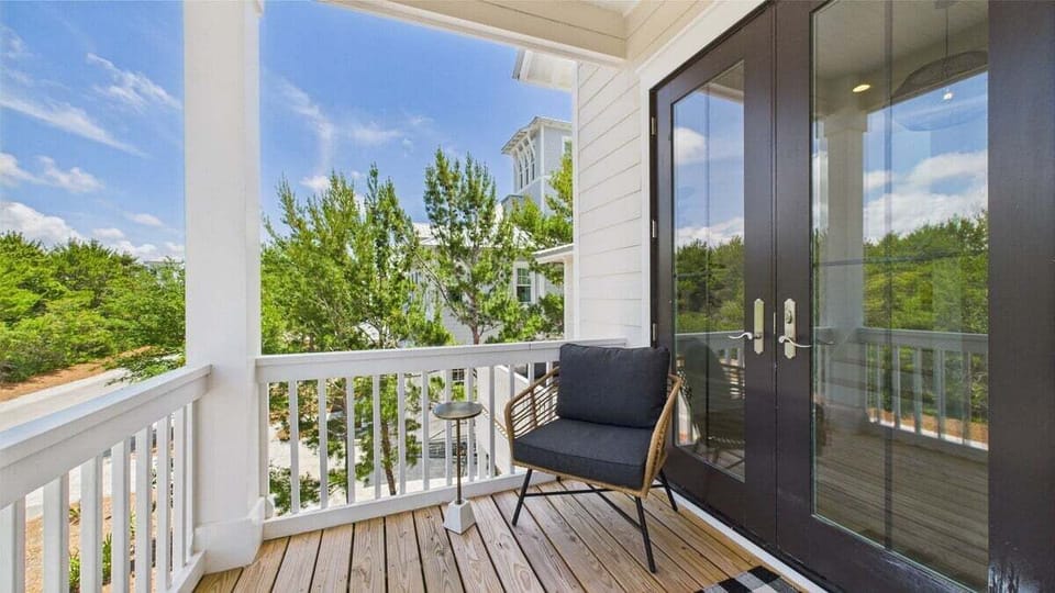 Second floor wraparound balcony with scenic views and seating