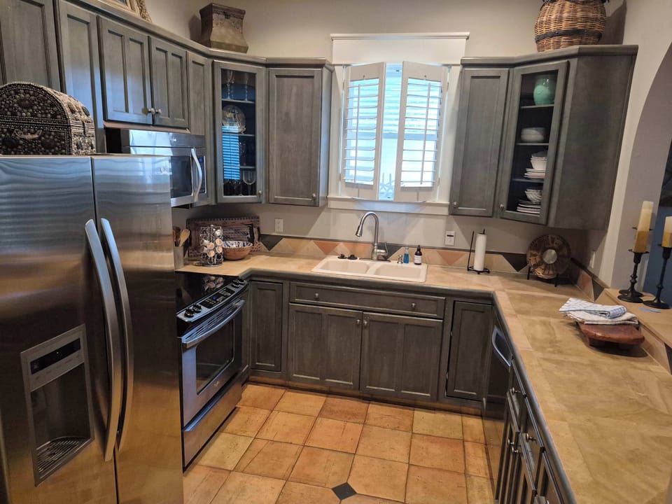 Kitchen with pass through to the right for serving the dining area!