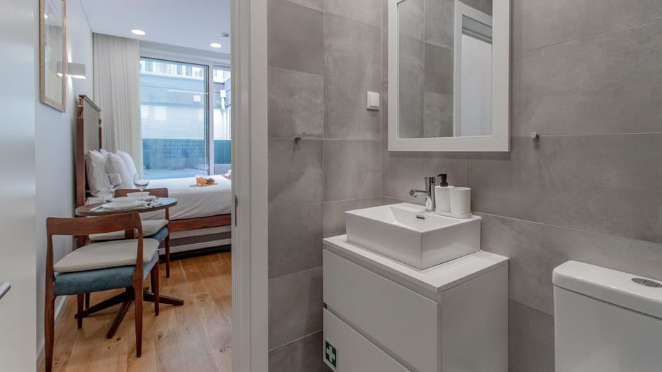 Step into the modern bathroom from your cozy studio, designed for both comfort and convenience.
#Bathroom #StudioApartment #LovelyStay