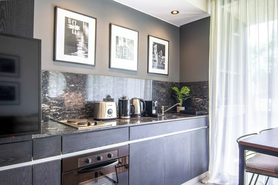 Comfort Apartment, Patio, Garden View | Private kitchen | Microwave, oven, stovetop, espresso maker