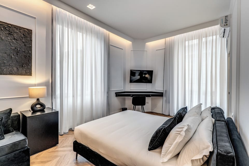 Superior Quadruple Room, City View | Desk, soundproofing, free WiFi