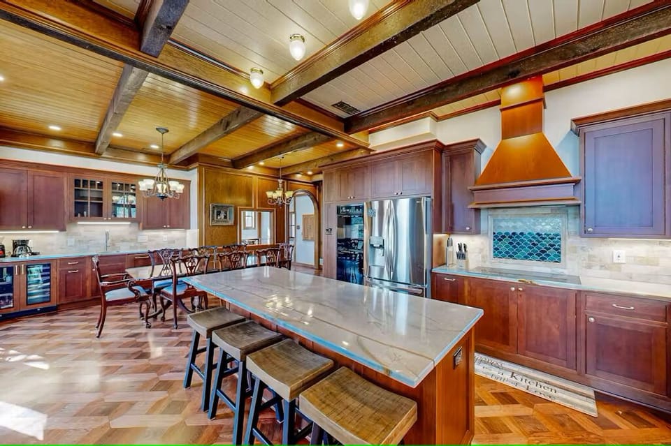 Island with seating for 4 in kitchen on second floor.