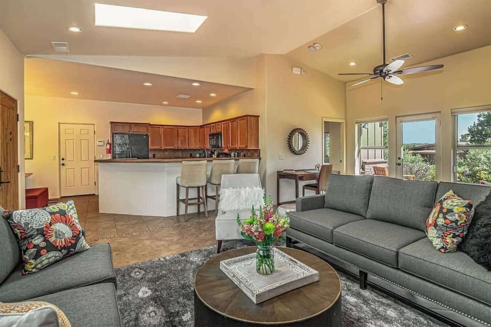 Lounge area with extra dining at the bar, office desk and fully loaded kitchen.