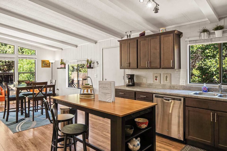 Fully-equipped kitchen and dining space. Cook up a feast and dine with ease!