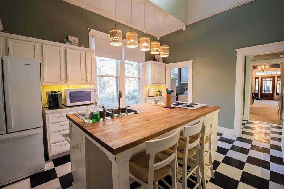 Gather around the butcher block island for easy meals and casual conversations.