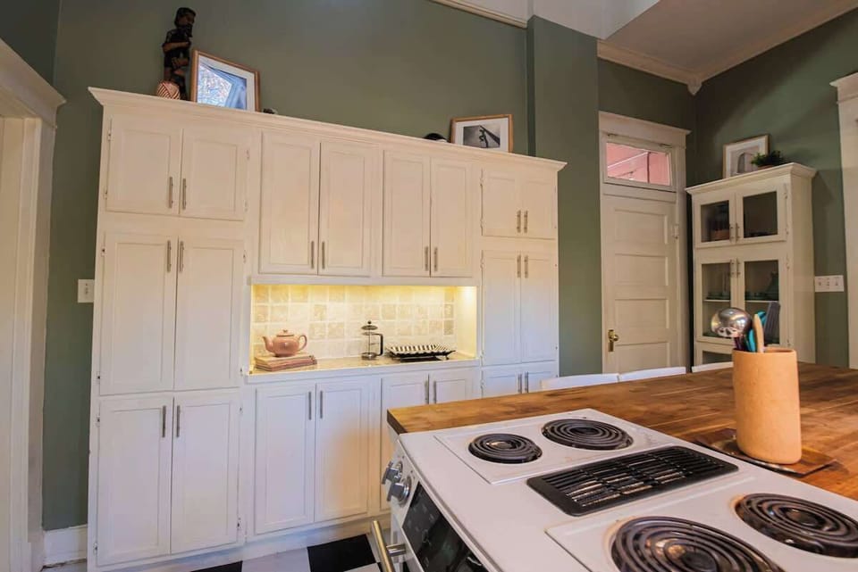 Enjoy abundant cabinet storage and an illuminated nook for convenient meal prep.