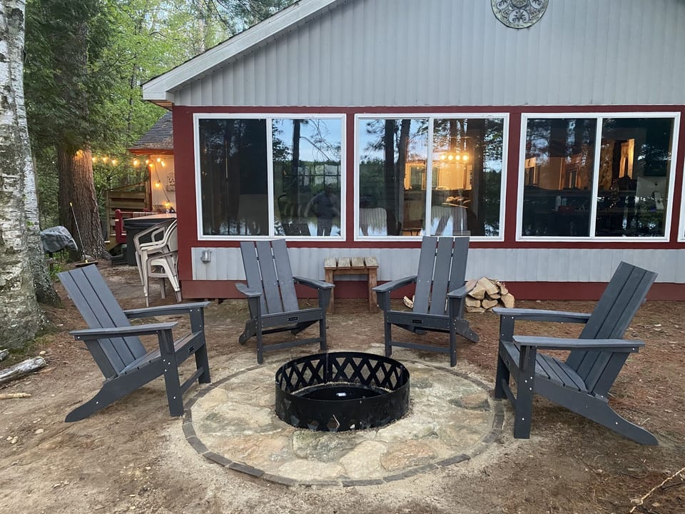 Firepit is close to the house for ease of use. Bring lots of firewood. You're going to want to be here all night!