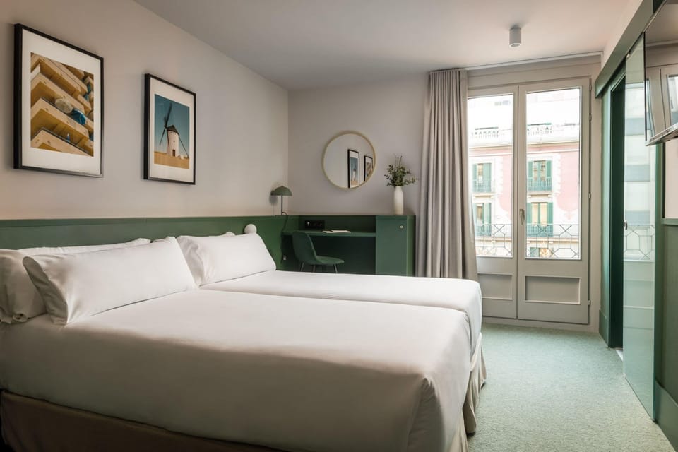 Twin Room, City View | Minibar, in-room safe, desk, laptop workspace