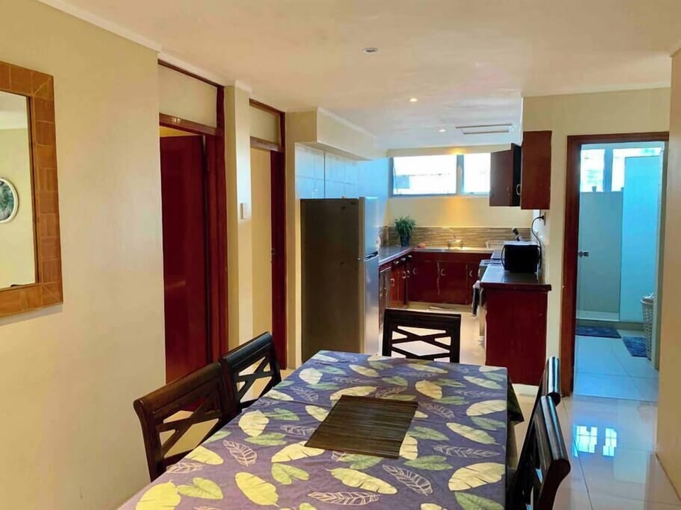 Dining room and kitchen - Equipped with a 4 burner gas stove and electric oven. 