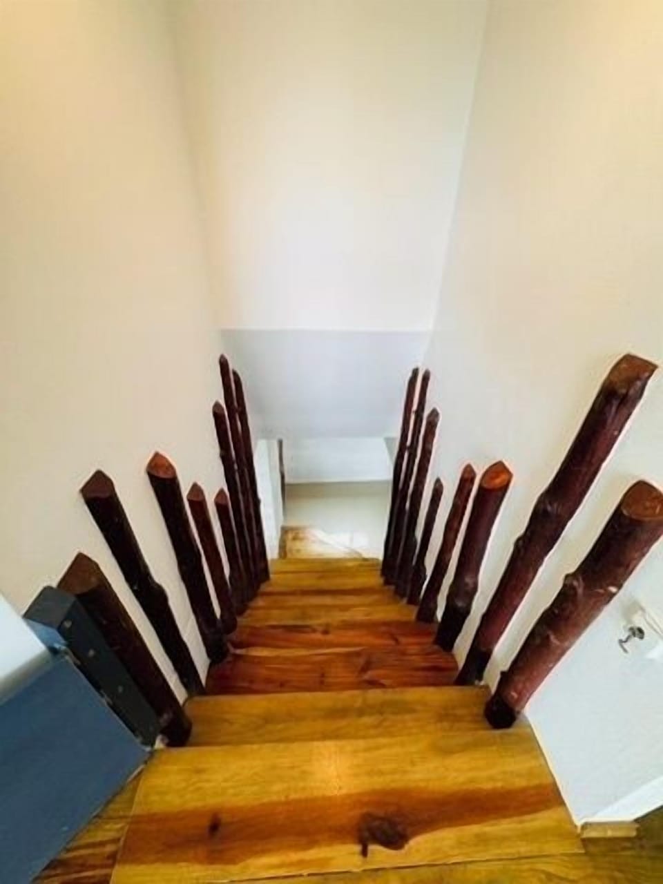 Stairs looking from upstairs to downstairs