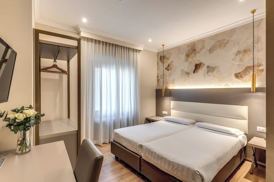 Superior Double Room | Minibar, in-room safe, desk, iron/ironing board