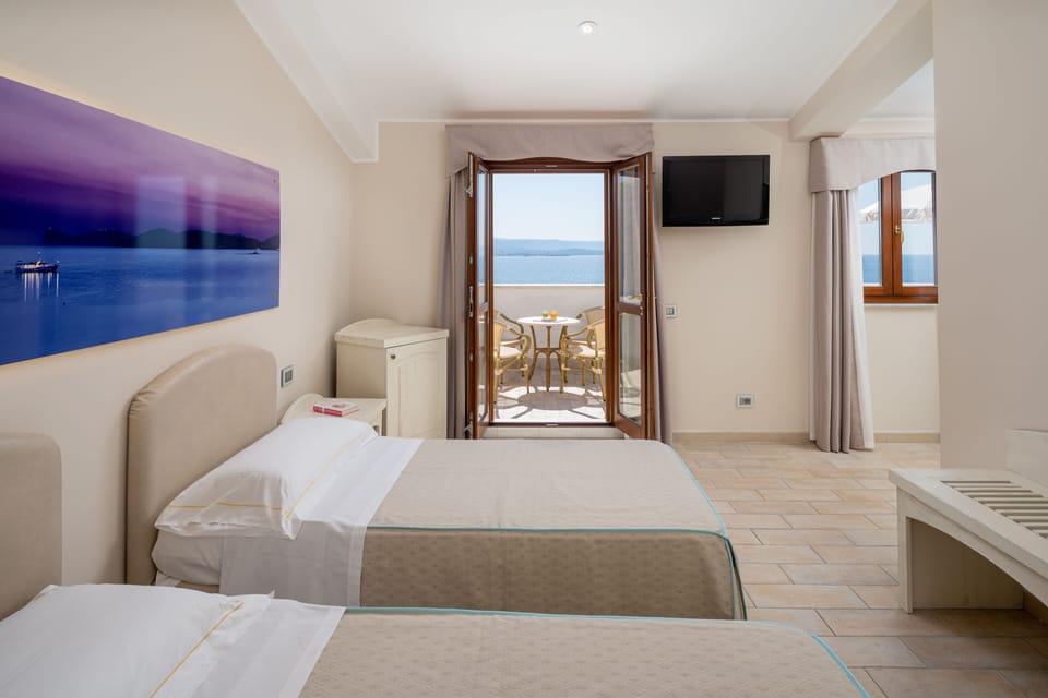 Family Room, Connecting Rooms, Sea View (connected by external balcony) | Select Comfort beds, minibar, in-room safe, desk