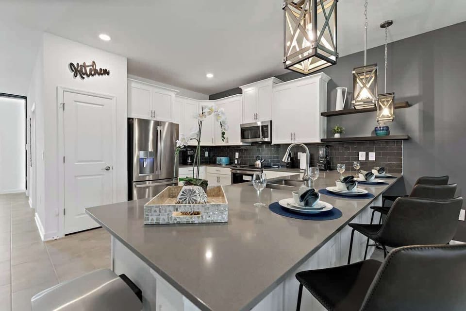Fuel up for a day of fun at Disney World in our fully equipped kitchen. Cook your favorite breakfast foods or grab a quick cup of coffee before heading out to explore. With modern appliances and ample counter space, our kitchen is the perfect place.